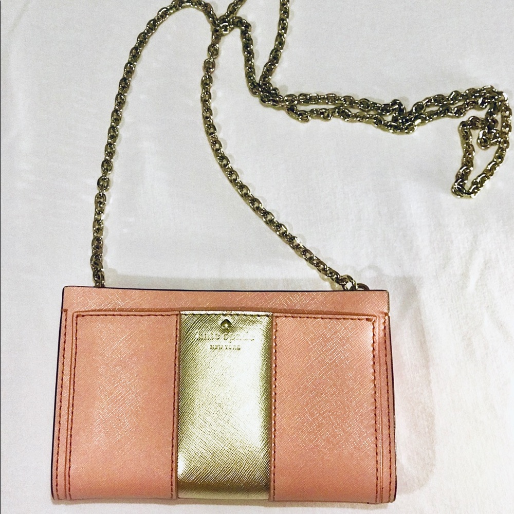 Kate Spade New York blush colored cross body bag.